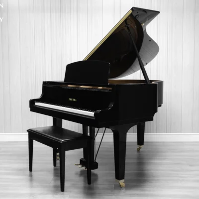 A Yamaha GH1 Baby Grand Piano in a high polish ebony finish.