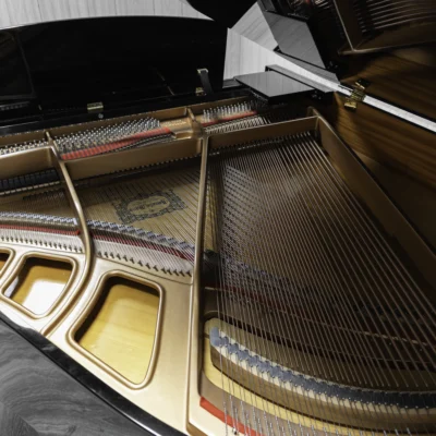 A Yamaha GH1 Baby Grand Piano in a high polish ebony finish.