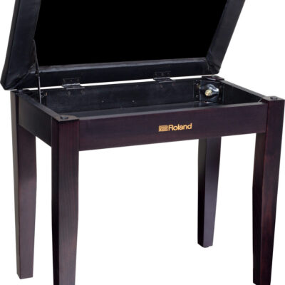 Roland RPB-100 piano bench in rosewood finish with the cushioned black vinyl seat top open to reveal the storage compartment