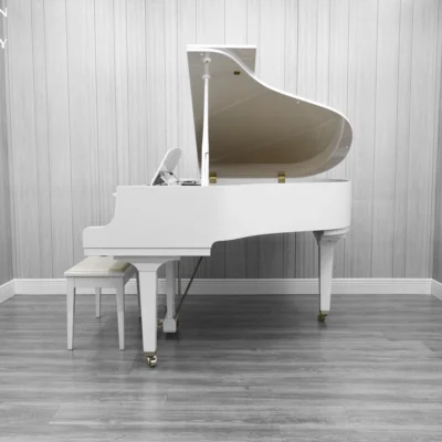A Yamaha GH1 baby grand piano in a high polish white finish