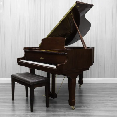 Haileer baby grand piano in high polish mahogany.