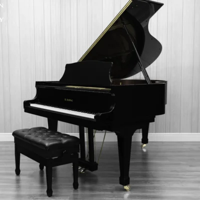 A Kawai RX-3 grand piano in a high-polish ebony finish.