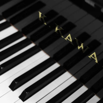 A Kawai RX-3 grand piano in a high-polish ebony finish.