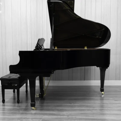 A Kawai RX-3 grand piano in a high-polish ebony finish.