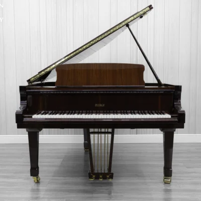 Petrof baby grand piano in high polish mahogany finish