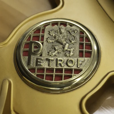Petrof baby grand piano harp logo