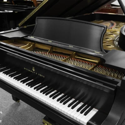A 9ft Steinway D Concert Grand Piano in hand-rubbed satin ebony finish.