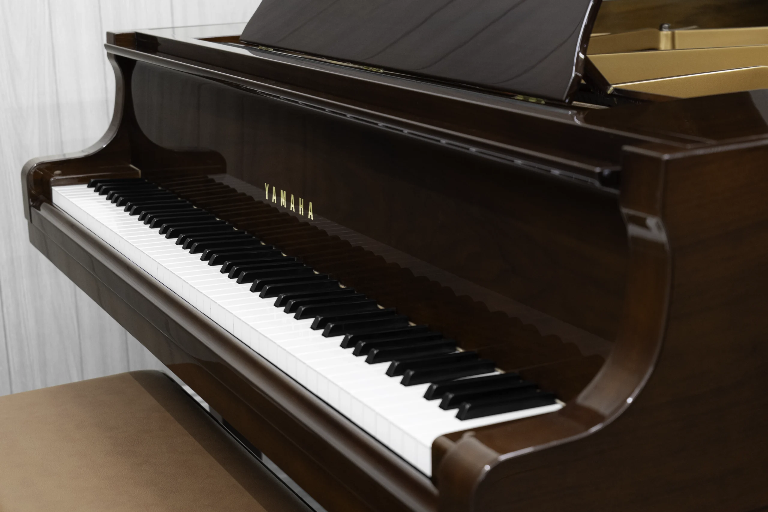 Yamaha GB1K baby grand piano in high-polish mahogany finish.