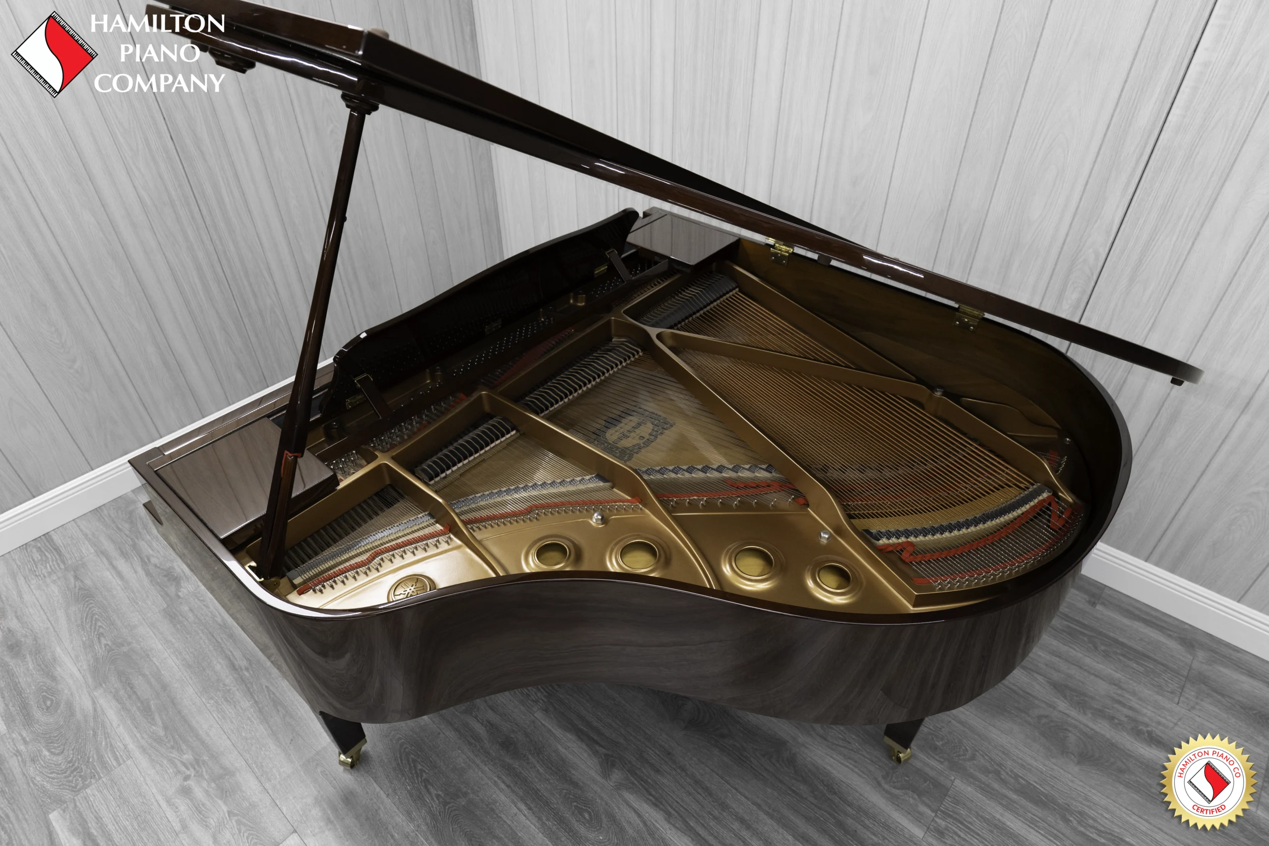 Yamaha GB1K baby grand piano in high-polish mahogany finish.
