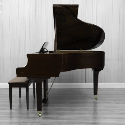 Yamaha GB1K baby grand piano in high-polish mahogany finish.